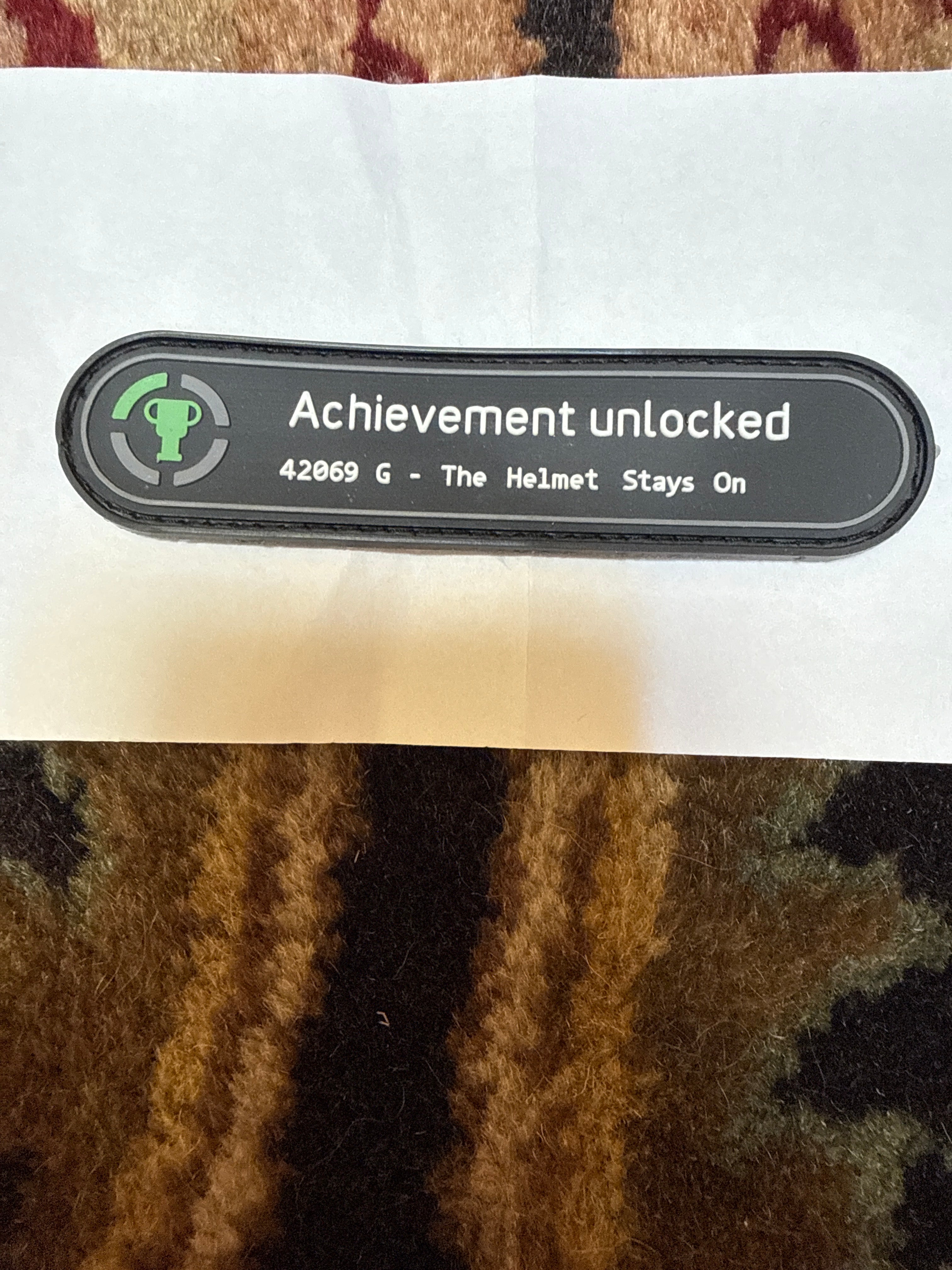 Achievement Patch - The Helmet Stays On